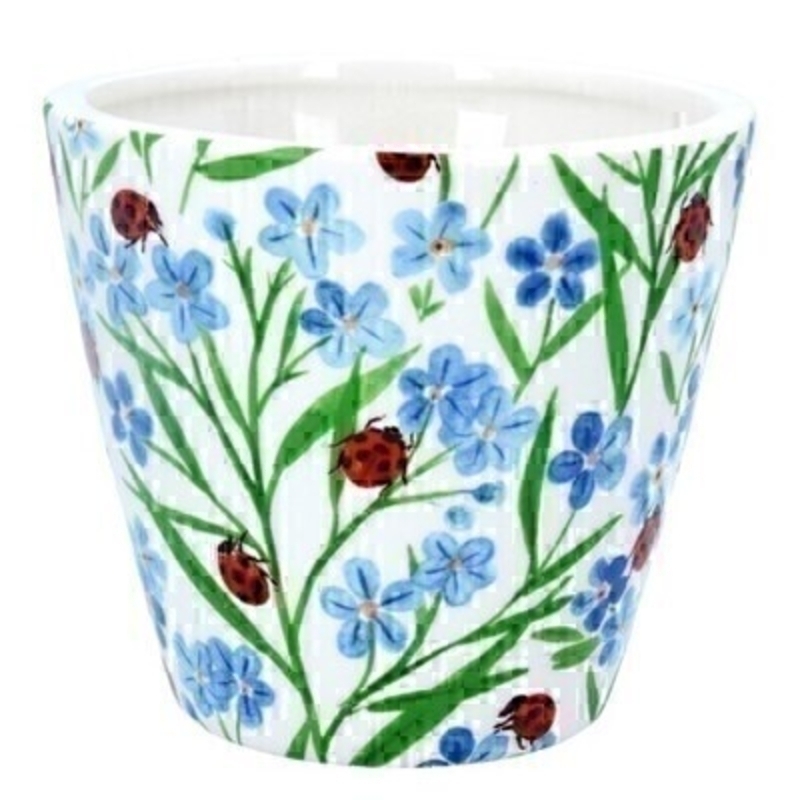 This ceramic pot cover with a blue forget-me-not and red ladybird design is made by the London based designer Gisela Graham who designs really beautiful gifts for your home and garden. It is suitable for an artifical or real plant. Great to show off your plants and would make an ideal gift for a gardener or someone who likes plants. Matching items availale.